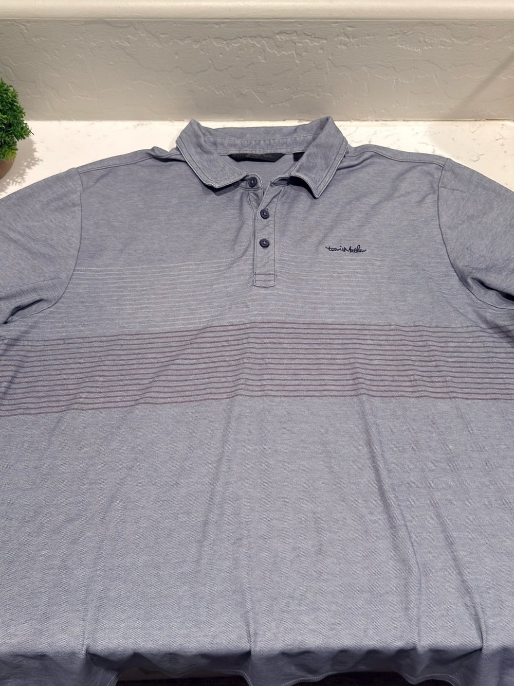 Travis Mathew Heathered Light Gray Polo with Subtle Horizontal Stripes